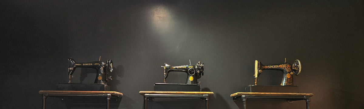 Kingsdown craftsperson sewing mattress materials in the factory